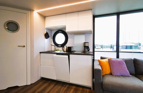 Schleswig Boat Rental | Houseboat Fjord Serina with bio-sauna and roof terrace in Schleswig