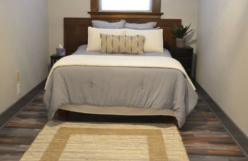 Dallas Center Apartment | Huge Lower Level Suite in 1913 Historic Church