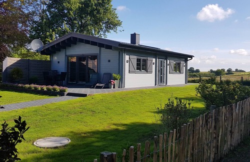Martensrade House | Idyllisches Blockbohlenhaus mit eigenem Garten und Sauna zum Wohlfühlen