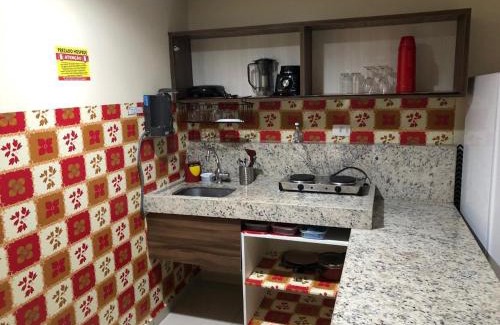 Tambau Apartment | IMPERIAL FLAT com Roupa de Cama, Camareira, vista para o mar.