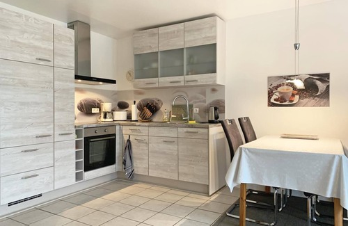 Kronsgaard Apartment | In Kronsgaard, only 1 km from the Baltic Sea beach, the cozy vacation apartment "Strandgold" awaits you, with a fenced garden for your four-legged friend, to enjoy your well-deserved vacation far away from the stress of everyday life