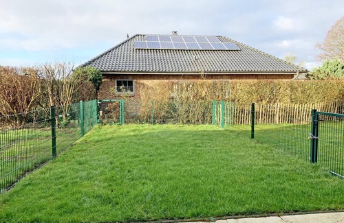 Kronsgaard Apartment | In Kronsgaard, only 1 km from the Baltic Sea beach, the cozy vacation apartment "Strandgold" awaits you, with a fenced garden for your four-legged friend, to enjoy your well-deserved vacation far away from the stress of everyday life