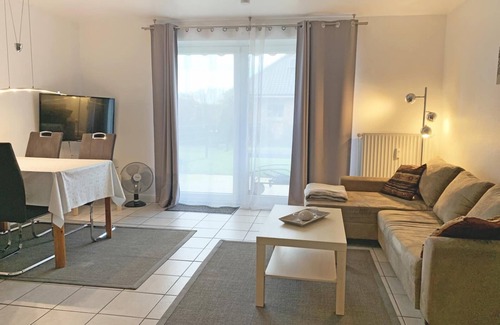 Kronsgaard Apartment | In Kronsgaard, only 1 km from the Baltic Sea beach, the cozy vacation apartment "Strandgold" awaits you, with a fenced garden for your four-legged friend, to enjoy your well-deserved vacation far away from the stress of everyday life