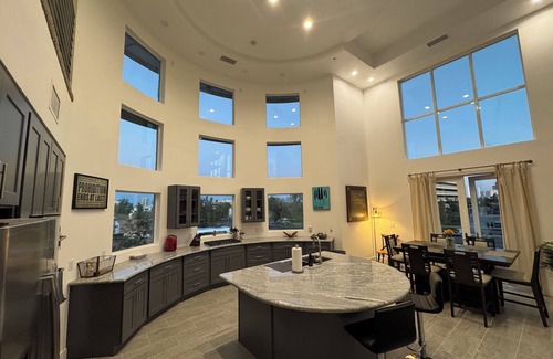 Rancho Oakey Condo | Incredible 2 level loft with 30ft ceilings -expansive balcony with STRIP VIEWS!