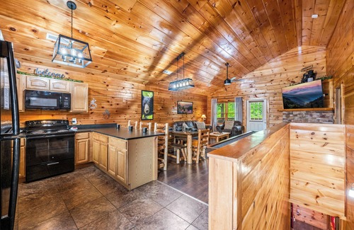 Pigeon Forge Cabin | Indoor Pool-Theater-Bunk Beds with Slide-Game Room-Hot Tub-5 min to Attractions!