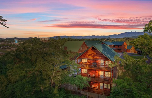 Pigeon Forge Cabin | Indoor Pool-Theater-Bunk Beds with Slide-Game Room-Hot Tub-5 min to Attractions!