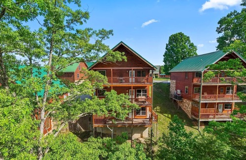 Pigeon Forge Cabin | Indoor Pool-Theater-Bunk Beds with Slide-Game Room-Hot Tub-5 min to Attractions!
