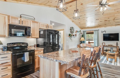 Arkdale House | Inviting home with game room, firepit, full kitchen, & W/D