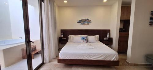 Luis Donaldo Colosio Apartment | Itzamná Suite Deluxe con Jacuzzi