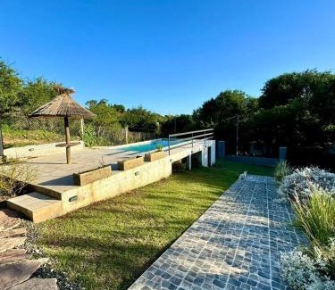 Comuna Estancia Vieja House | Jacarandá