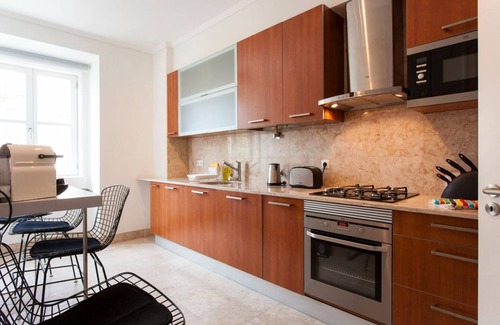 Santa Maria Maior Apartment | JOIVY Stylish 2BR Apt w/balcony at the heart of Baixa