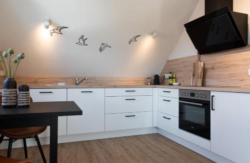 Mildstedt Apartment | Küstenbutze im modernen Style mit Balkon