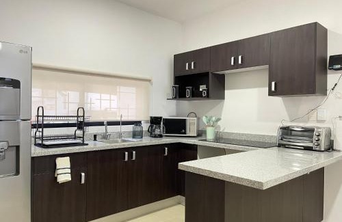 Merida House | Kaab: Exclusividad y confort en un oasis vacacional con piscina