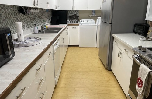 Waialae Iki Condo | Kahala Beachfront Unique Bohemian Home