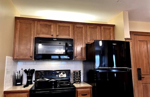 Snowshoe Apartment | King Bed Slope Side Retreat in Village Central