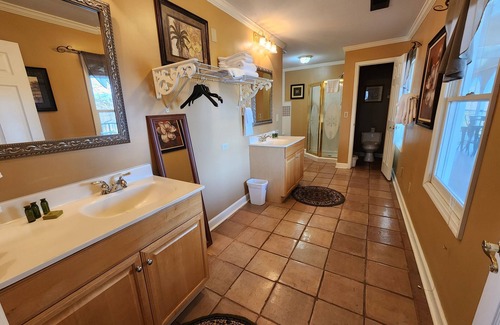 Lookout Valley Neighborhood Association Cabin | King Room with Sofa Bed and Balcony with River Views