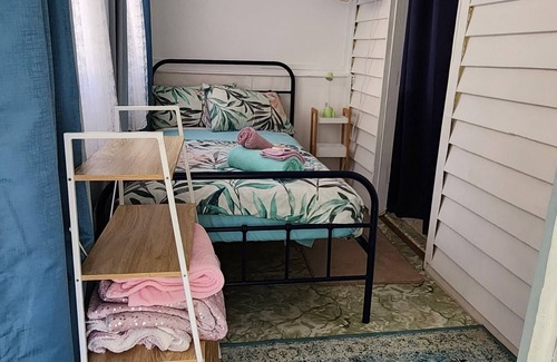 Mount Morgan Bed & Breakfast | King Single plus 3 Singles in Meyenburg House with shared bathroom & kitchen