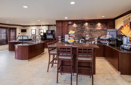 Biggs Field Apartment | King Studio | Free Breakfast Buffet. Pool & Hot Tub Access.