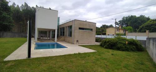 Tomino House | La casa de Cristal