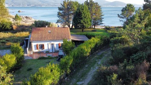 Muros House | La Casita de la Playa Escondida