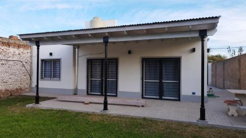 Pergamino House | La Tranquila