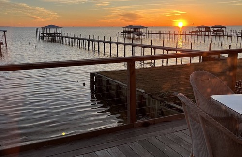Fairhope Cabin | Labor Day Weekend Open! Sandy Beach, gorgeous sunsets, great front porch view!
