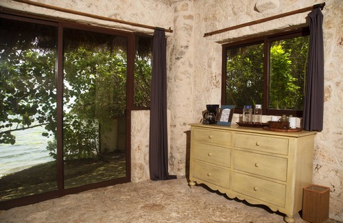 Mario Villanueva Madrid Cabin | Lagoon Front Suite with Bikes & Kayaks