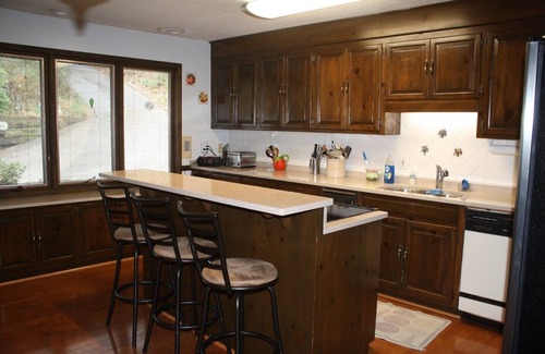 Serenity Bay House | Lake Keowee lakefront 4BR 3 bath home dock, screened porch, fire pit, tram.