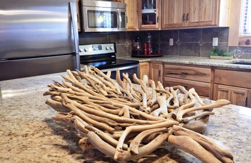 Mount Ida Cottage | Lake view three bedroom, three bath cottage with private hot tub overlooking Lake Ouachita. by RedAwning