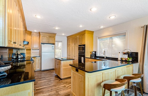 Worley House | Lakefront home on Lake Coeur d'Alene w/tram, dock, kayaks, SUPs & decks