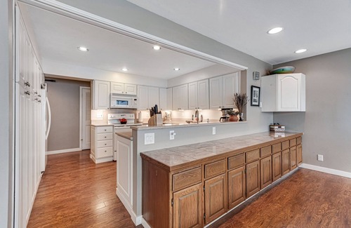 Olympia House | Lakefront home with canoe, kayaks, large deck, beach access, fireplace, & W/D