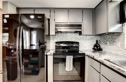 Regency Park House | LAKEFRONT PROPERTY, LARGE HEATED POOL, newly renovated. Welcome to "Our Nest"