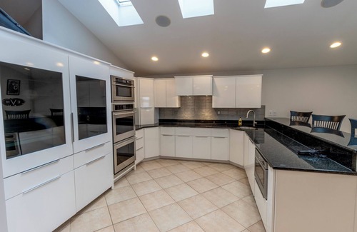 La Porte House | Lakefront Tech-savvy Home with Pool & Hot Tub