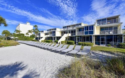 Longboat Key Apartment | LaPlaya 201C Breathtaking Gulf panorama from this corner end unit with a private stairway to the beach