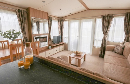 Mynachlogddu House | Large, deluxe 12ft-wide caravan with one double with en suite W.