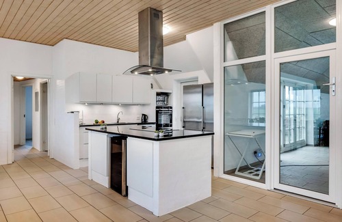 Vedersø Klit House | Large holiday home for 20 people with large pool, Hot tub for 7 people and activity room.