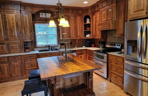 Ten Mile House | Large lake property in Ten Mile, amazing sunset views, two boat slips, fire pit