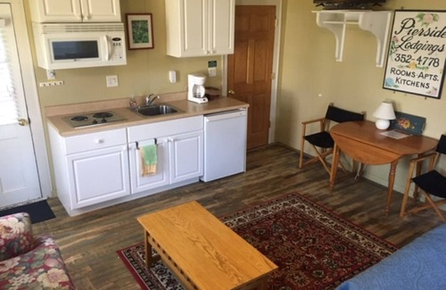 Frankfort House | Large studio suite w/private back porch entrance one block from the beach.