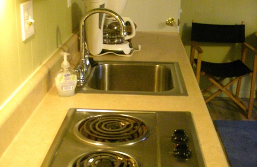 Frankfort House | Large studio suite w/private back porch entrance one block from the beach.