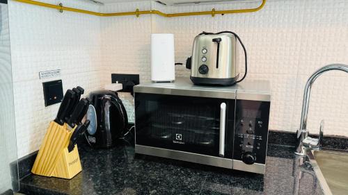 International City Apartment | Lawnz Luxury furnished studio with Balcony Swimming Pool Gym Kids play ground