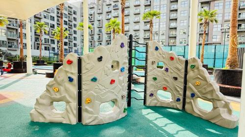 International City Apartment | Lawnz Luxury furnished studio with Balcony Swimming Pool Gym Kids play ground