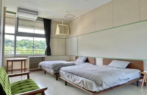 Uruma Hotel | LivingAnywhere Commonsうるま twin bed room - Vacation STAY 88989v