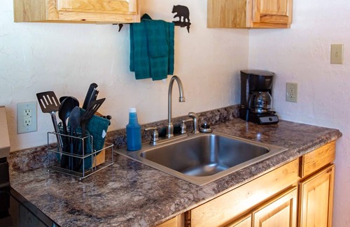 Red River Cabin | Located on the river, facing the Mountains