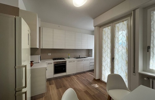 Belluno House | Locazione Glicine with 3 rooms for 4 guests with private parking and garden.