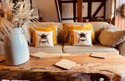Whitbourne House | Log- burner, Hot tub with woodland views Walking trails and local pub on your doorstep! Popular walking trails nearby-Malvern Hills and the Brockhampton Estate- Peaceful village on the border of Hereford and Worcester