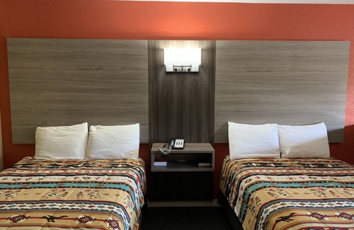 Bay Minette Hotel | Log Cabin Inn