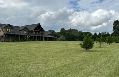 Bowdon Junction House | Log Castle and a Spring Fed Lake