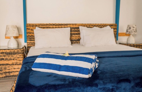 Gan House | LongBeach Laamu