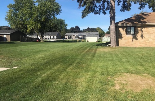 Green Bay House | Lot of Land right next to Lambeau - ask about availability for 2025 NFL Draft!