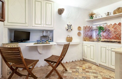 Capo d'Orso Apartment | Lovely apartment for 2 guests with A/C, TV and pets allowed